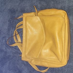 Yellow leather backpack
